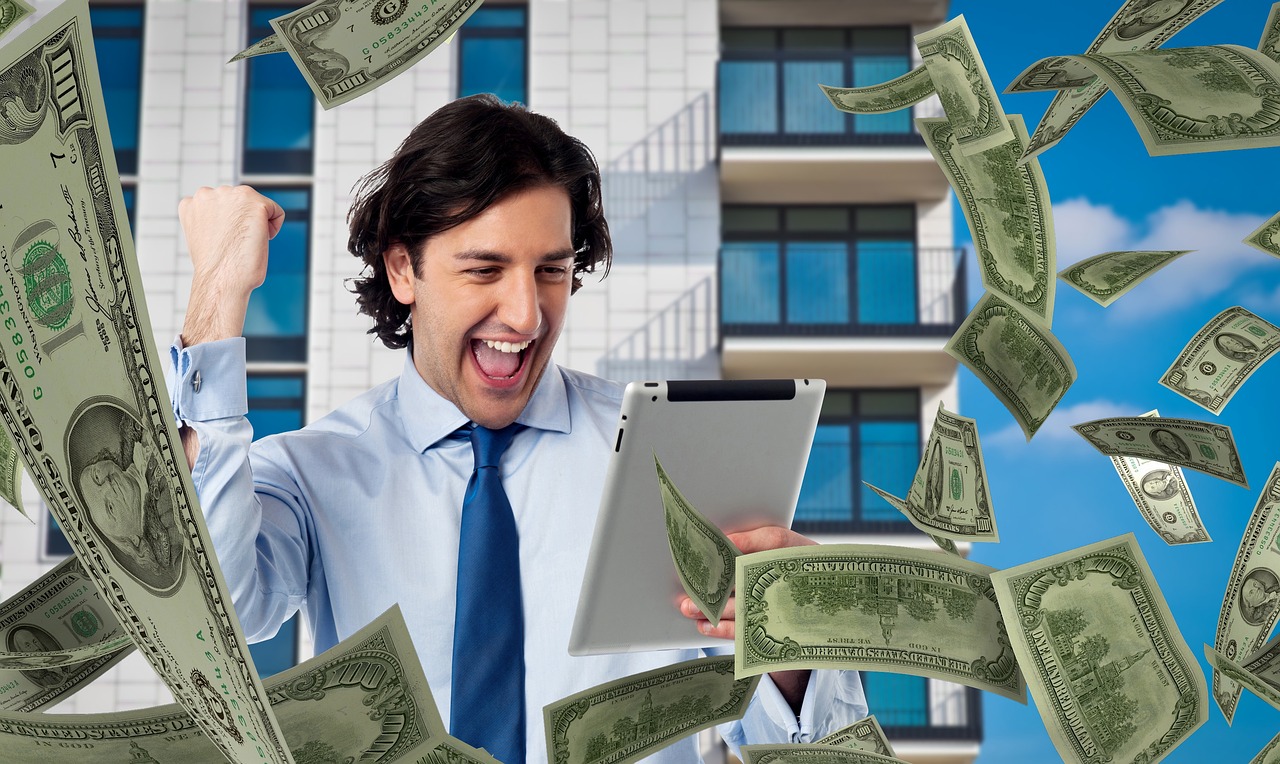 man with dollars raining around him